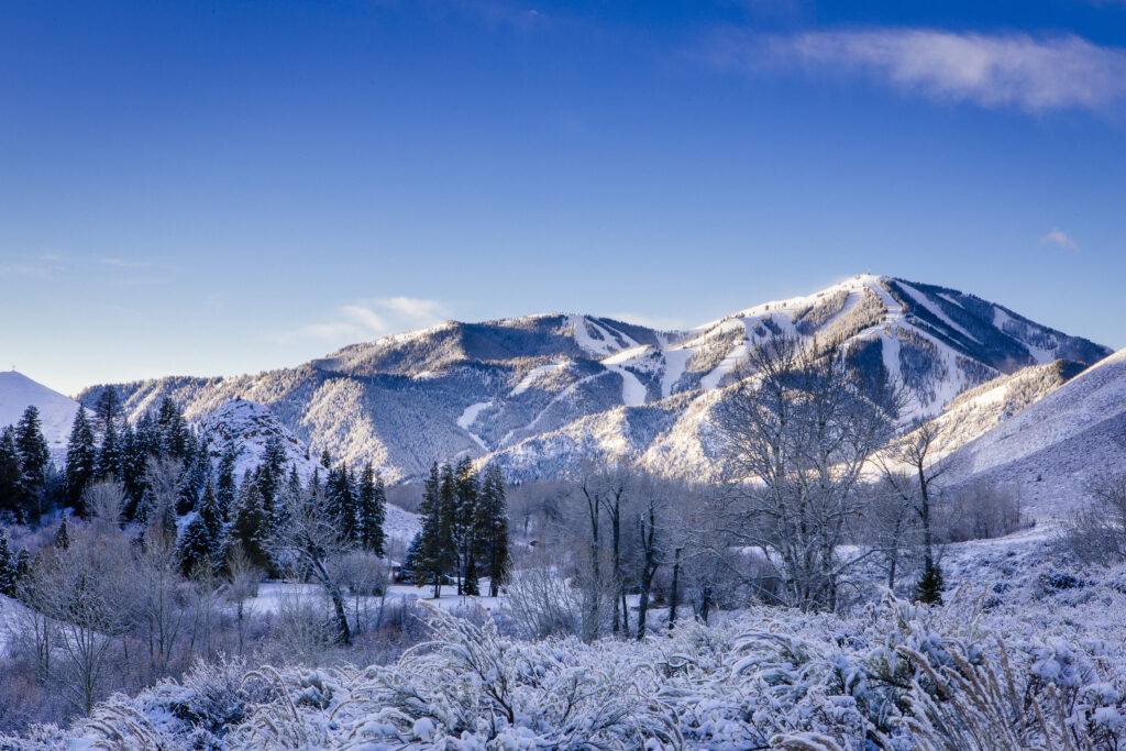 Bald Mountain in winter. Two new high-speed lifts open in December 2026, and the Stifel Sun Valley Finals return March 20 through 25, 2027.