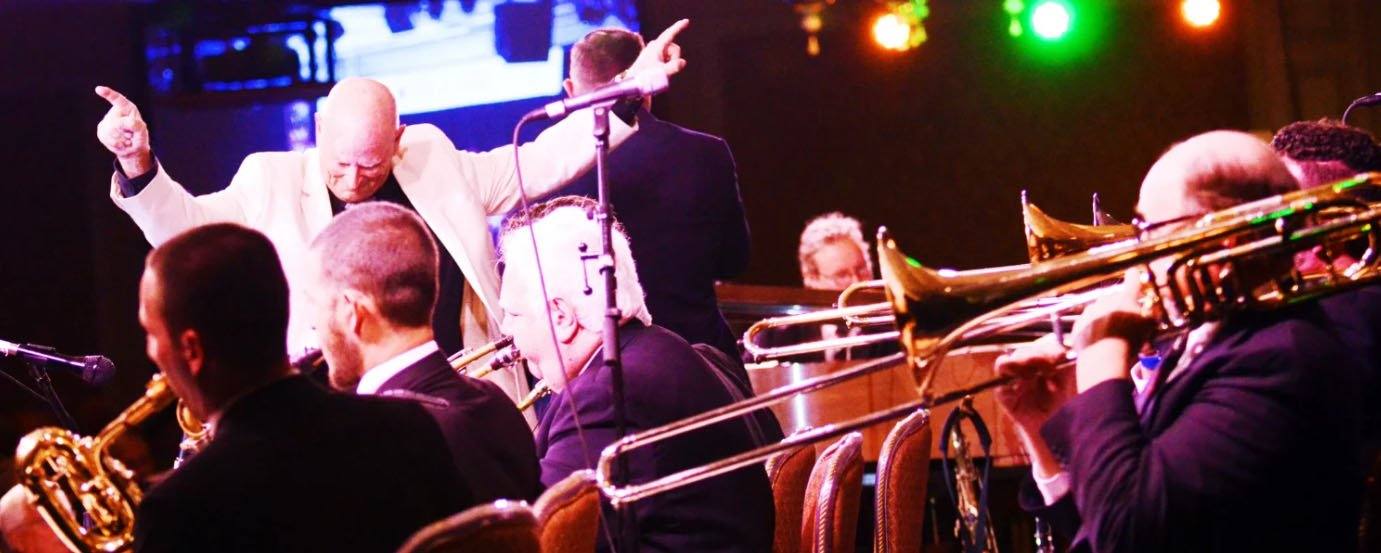 The Terry Myers Big Band in performance, in a photograph from the festival's own musicians page. The festival site says the band is joined by vocalists Meloney Collins and Shaymus Hanlin.