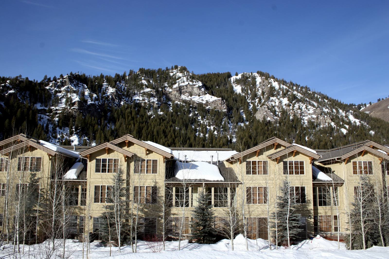 Sun Valley from above. The decisions that shape daily life here are made in public; our job is to read the documents before they become consequences.
